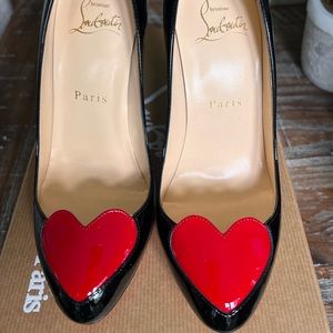 New never worn Doracora black 100 patent with red heart
